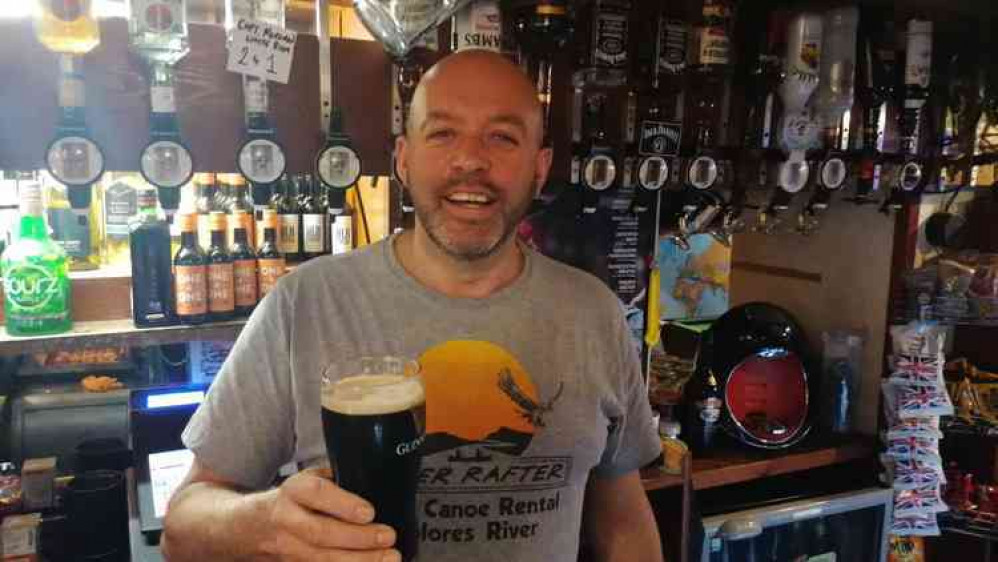 Landlord Eddie Pimlott with some Guinness