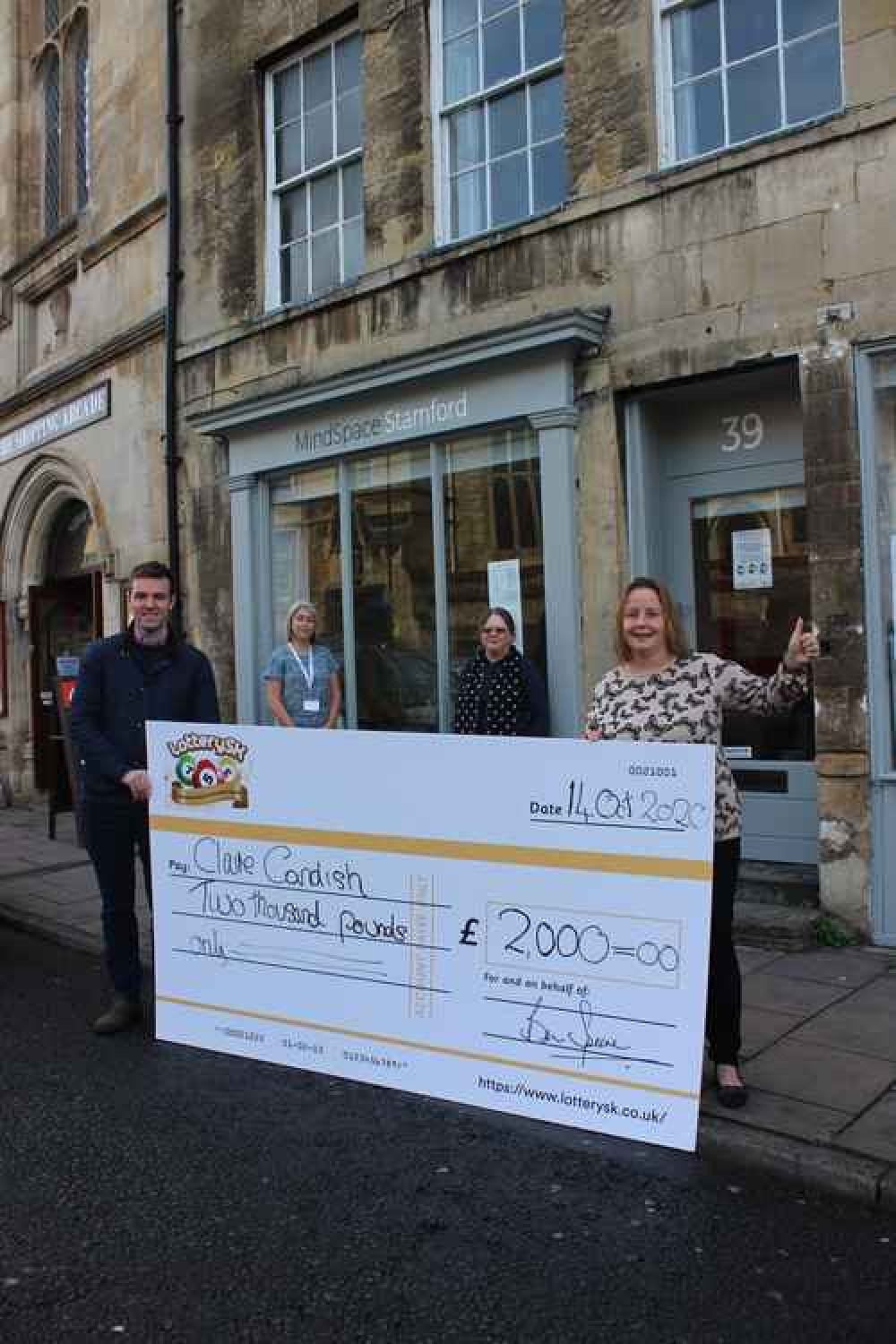 Stamford's £2,000 LotterySK prize winner Claire Candish (right) with SKDC Leader Cllr Kelham Cooke and Mindspace representatives Kevina Singleton and Katrina Mitchell