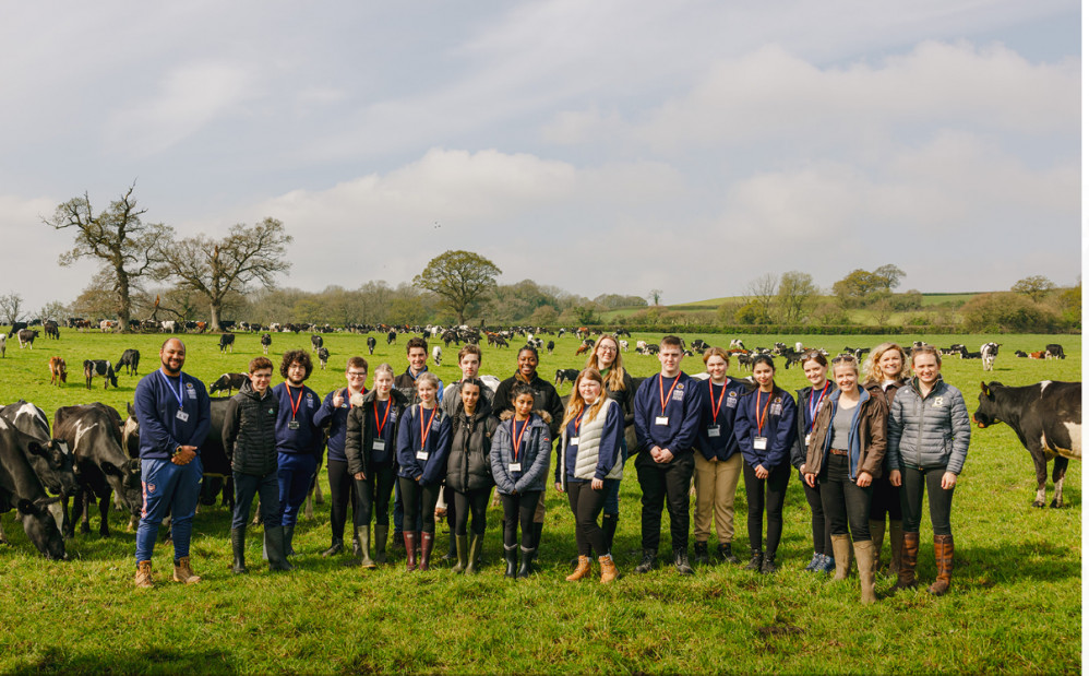 Students at McDonald's dairy farm in Sherborne