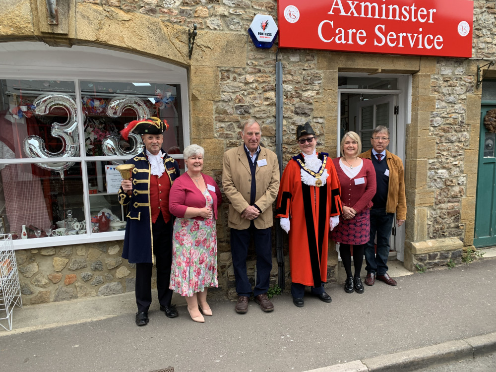 Pictured before the charity shop opening in South Street are (from the left): town crier Nick Goodwin, ACS secretary Jacqui Symes, ACS chairman Dr James Vann, the Mayor, Cllr Jill Farrow and ACS vice-chairman Mervyn Symes. 