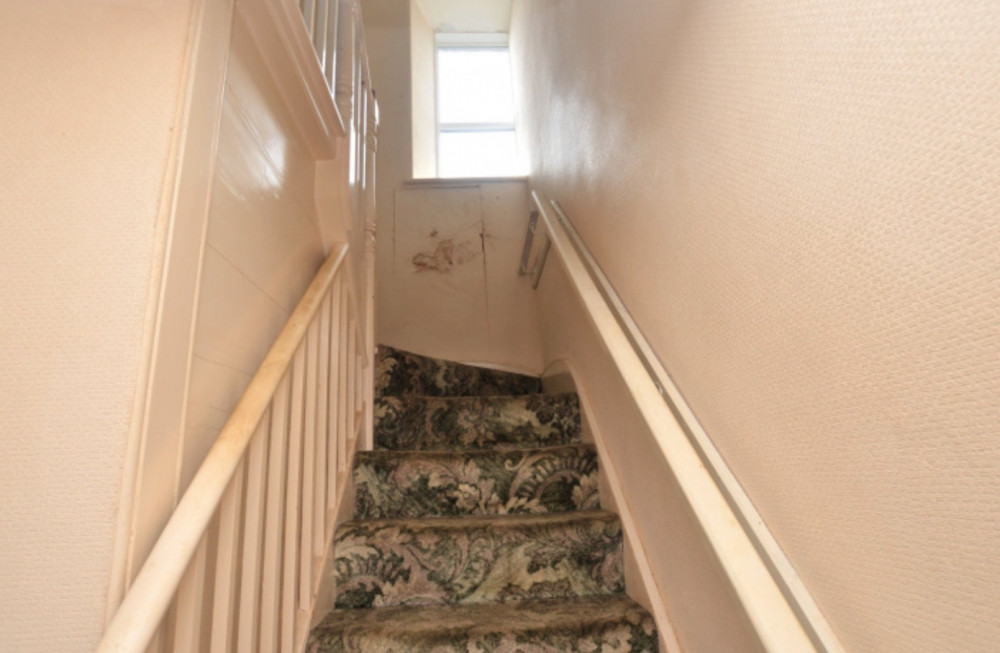 Stairs leading up to the bedrooms. 