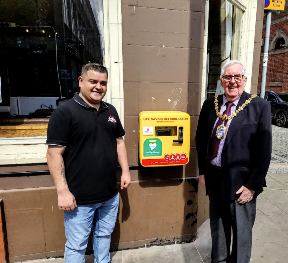 Three defibrillators have so far been installed around Crewe. The landlord of the Cheese Hall, Mark Desai with the Crewe Town Mayor, Cllr Tom Dunlop (Crewe Town Council).