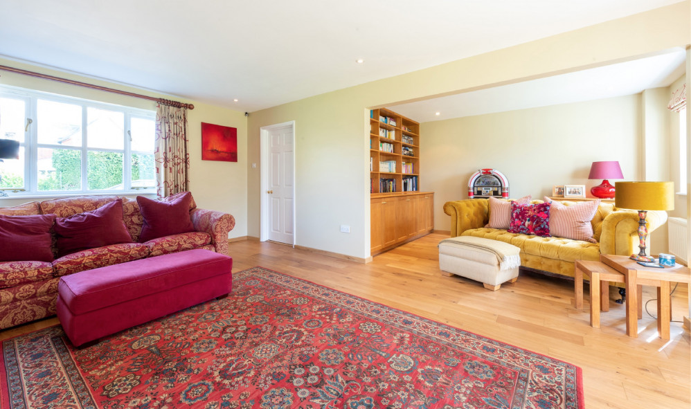 Bookcase and extended seating area (Picture credit: Chapman Stickels)