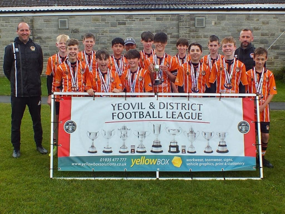 Axminster Town Under 13s with their runners-up medals in the Under 13s Division One Cup Axminster Town Under 13s with their runners-up medals in the Under 13s Division One Cup