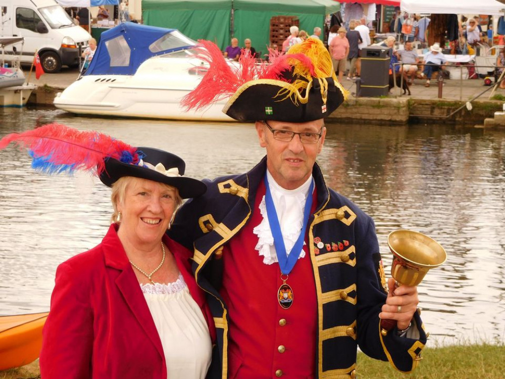 Axminster town crier Nick Goodwin pictured with his wife