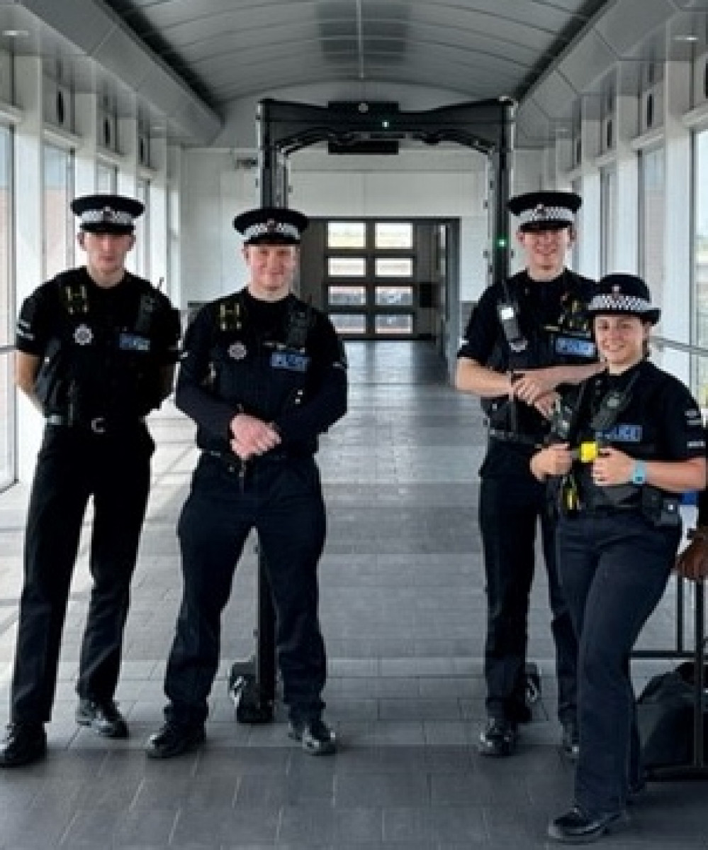 Police officers who manned a ;knife arch at Chafford Hundred station. 