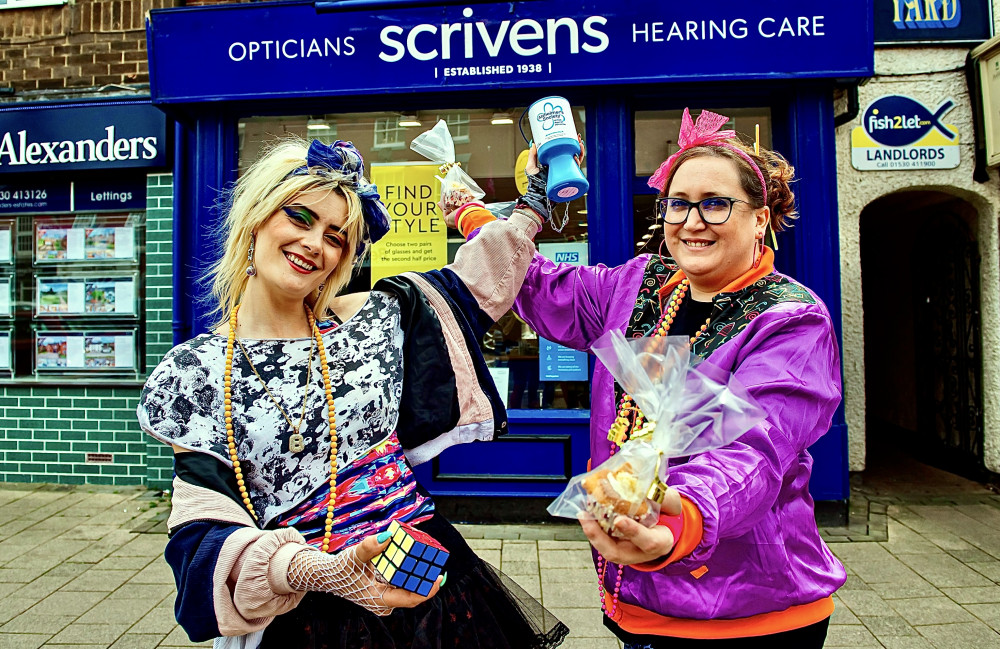 Sales advisor Lucy Walker (left) and manager Liz Holme-Cherry show off their 80s looks at Scrivens in Ashby 