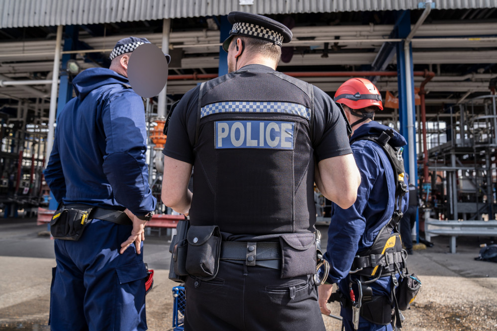 Police at the Exolum site last month. 