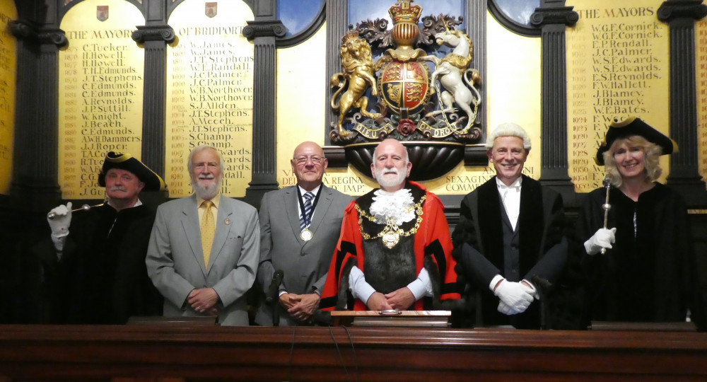 Bridport mayor, Cllr Ian Bark, centre, with deputy mayor Cllr Dave Bolwell, third left, and leader of the council Cllr Dave Rickard, second left