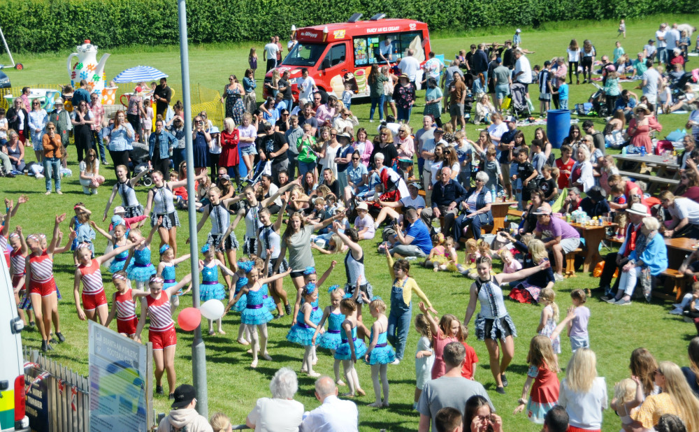 Crowd loved the young dancers Dancers, stilt-walkers, face-painting, bouncy castles, and the tea-pot roundabout were among the many attractions.