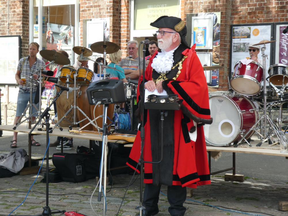 The mayor of Bridport, Cllr Ian Bark, makes a proclamation in Bucky Doo Square