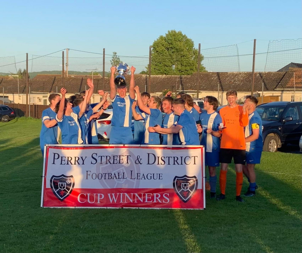 Uplyme Reserves celebrate winning the John Fowler Cup Uplyme Reserves celebrate winning the John Fowler Cup
