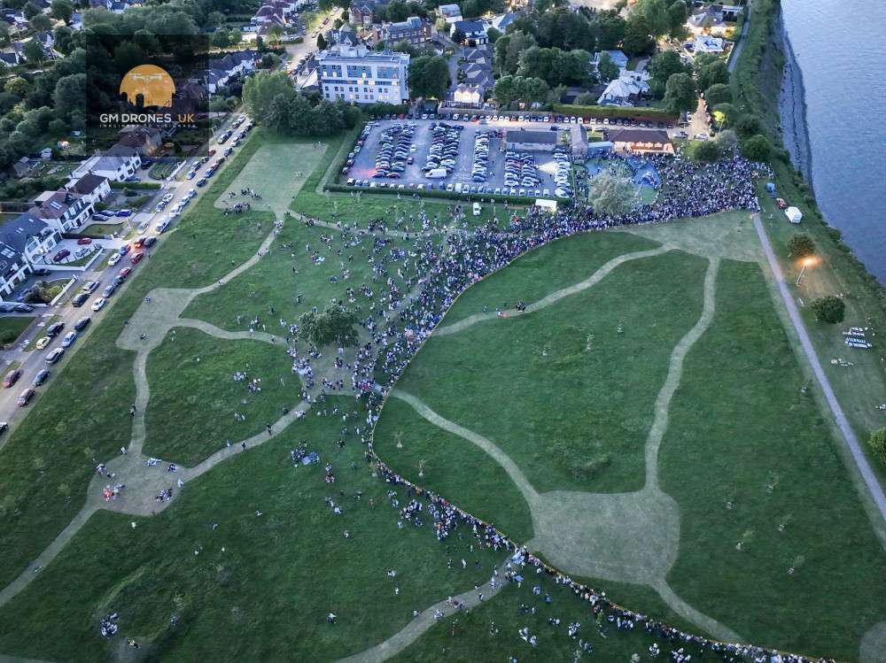 A view of the crowd gathering at the Penarth beacon lighting at the Cliff Top on June 2. (Image credit: @GmDrones – Twitter)