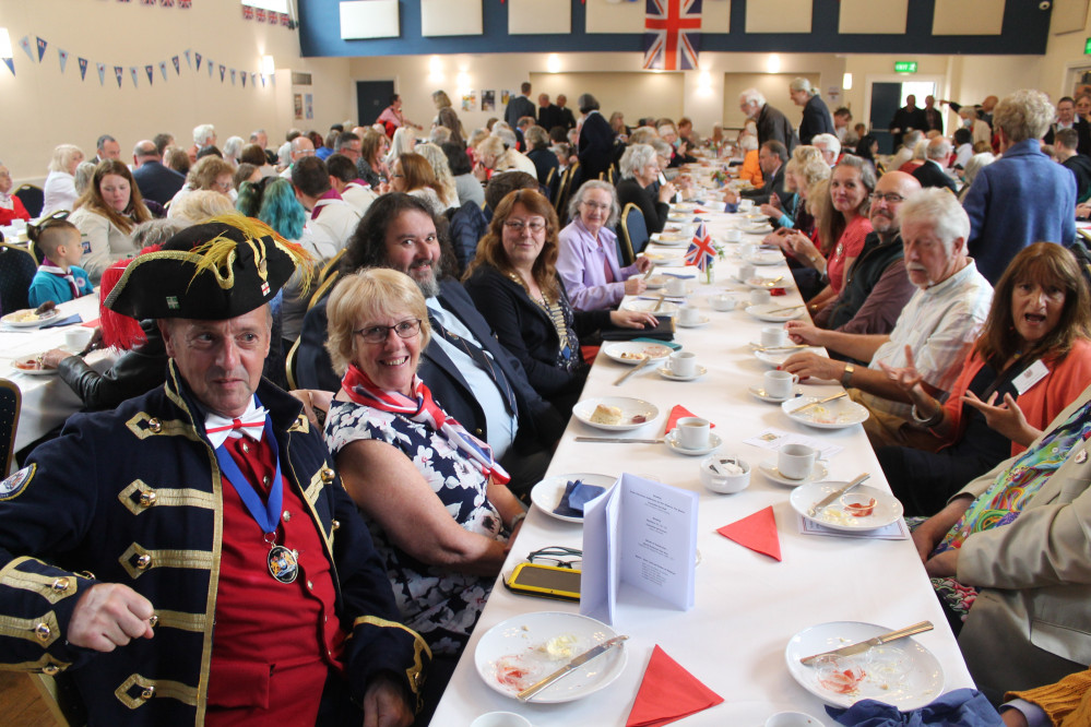 Axminster residents and guests packed into the Guildhall for a cream tea to round off the jubilee weekend