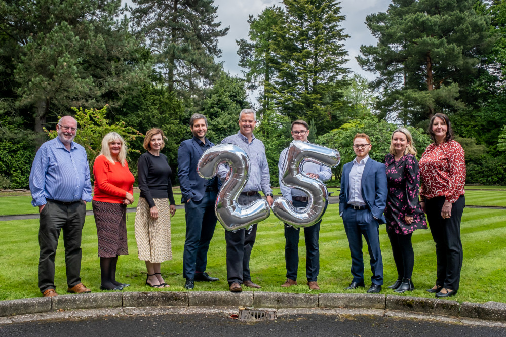 Chamber Chief Executive and Events & Marketing Coordinator Dominic Hibbert (centre) with colleagues marking 25 years of the Business Awards (Jan Roberts).