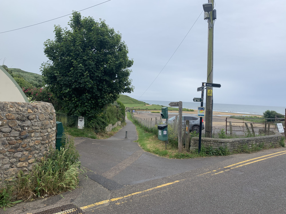 Go down the lane next to the car park