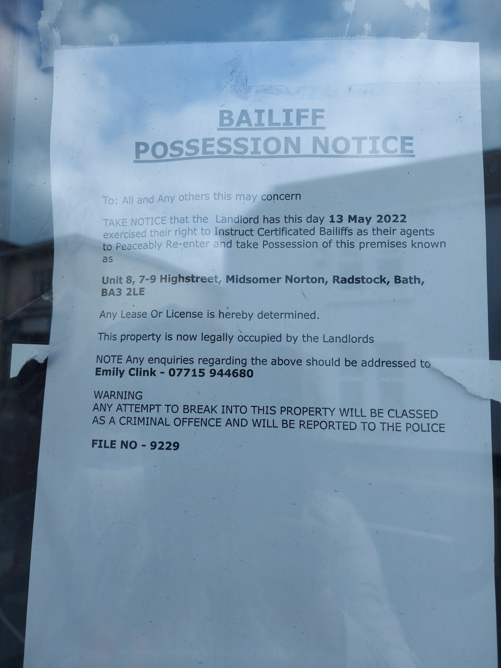 The bailiff notice in the window of this Midsomer Norton store 7-9 High Street