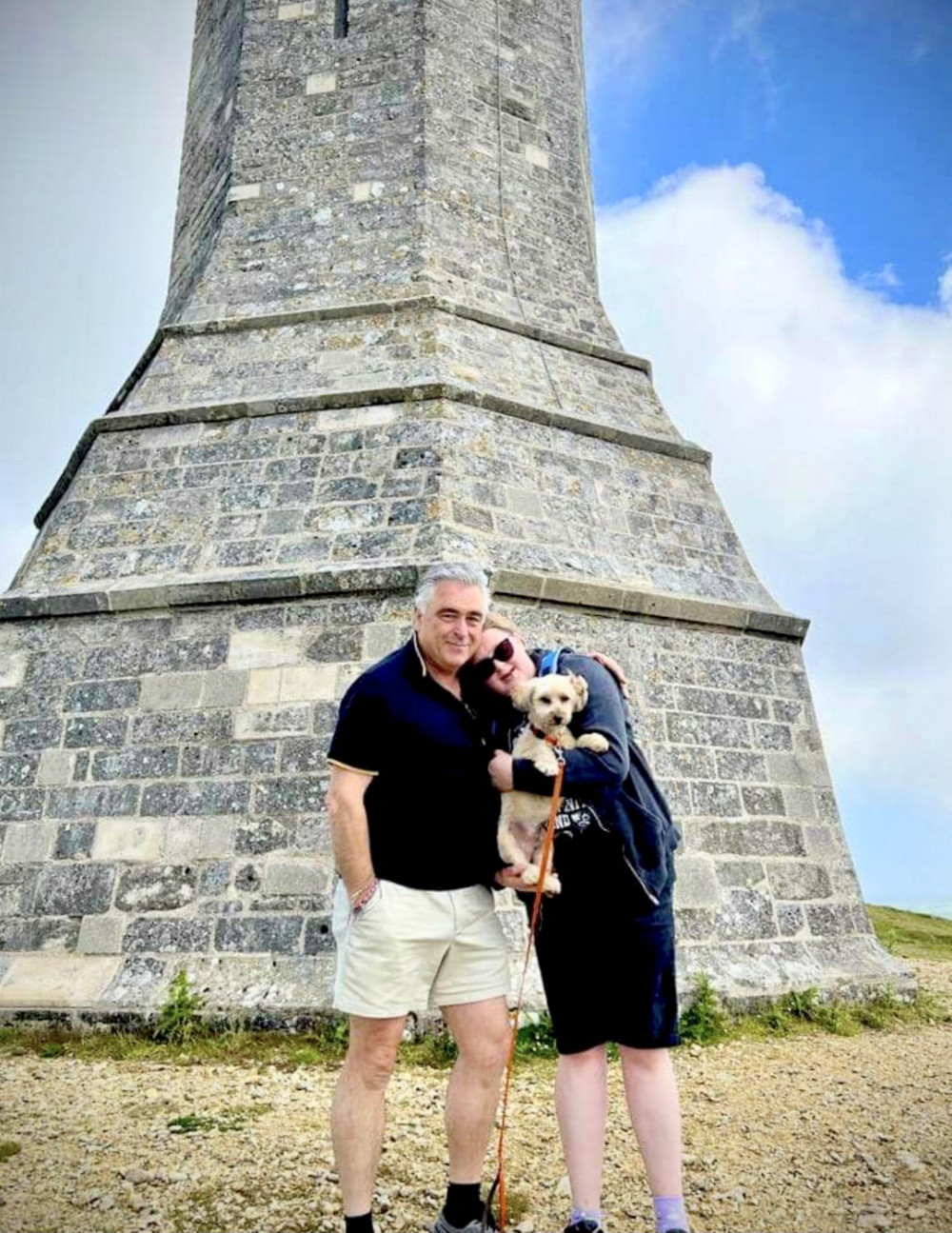 Jess and her dad, Shaun, at the finish line at the Hardy Monument