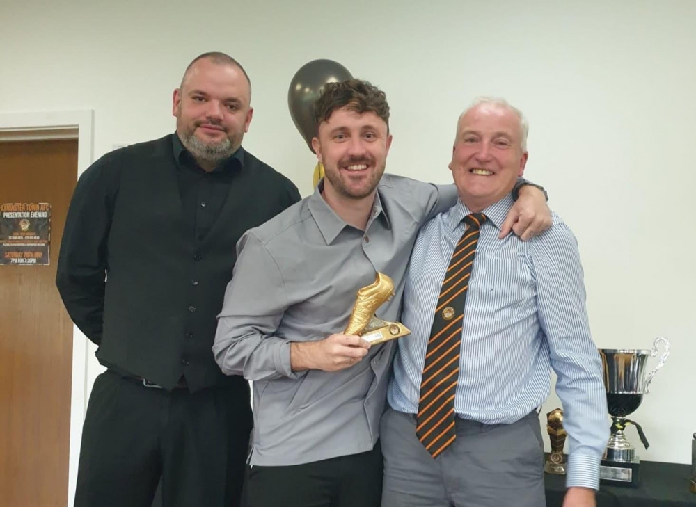 Golden Boot recent for scoring most goals - Josh Wadham pictured with manager Dan Prettejohn and trustee Les Bounds Golden Boot recent for scoring most goals - Josh Wadham pictured with manager Dan Prettejohn and trustee Les Bounds