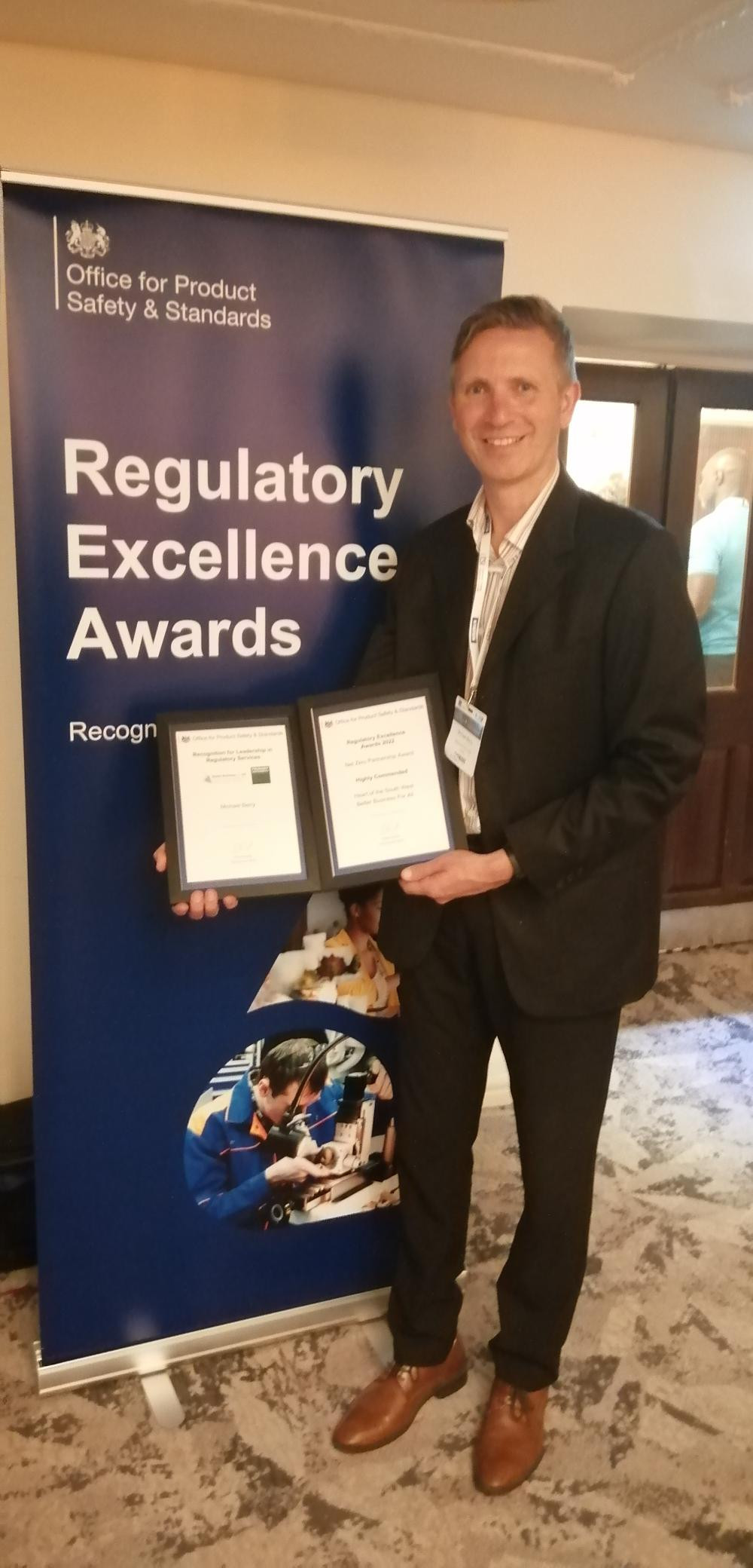 •	Michael Berry, MDC Environmental Health Officer accepting two awards for the wasted food project at the Regulatory Excellence Awards 2022.