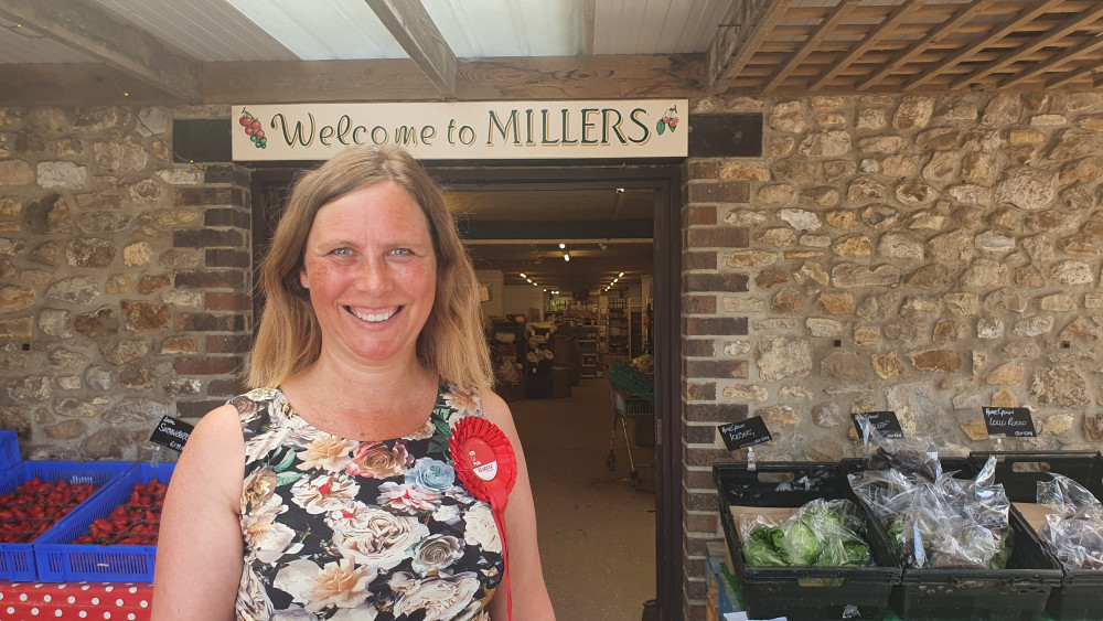 Liz Pole, the Labour Candidate, outside Millers Farm Shop in Axminster