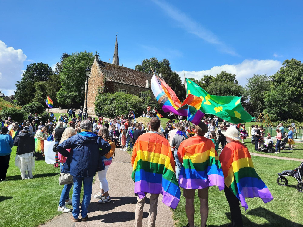 The LGBT+ flag and Rutland flag flying in unison in Cutts Close 