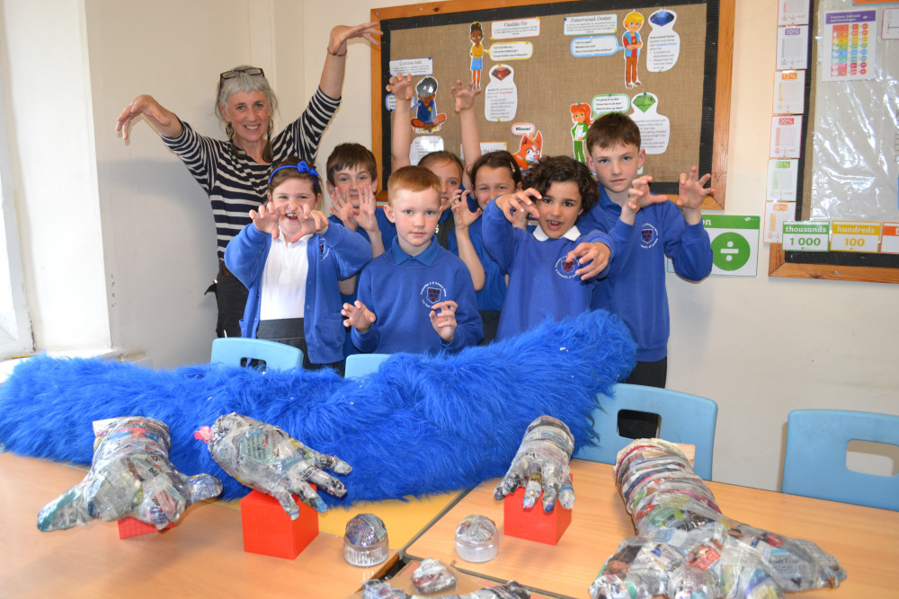 Pupils at Croscombe school build a puppet to give out hugs