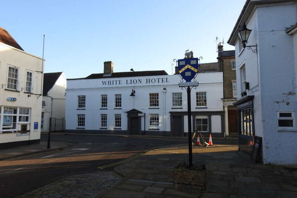 Hadleigh town sign and White Lion Hotel - Credit: Adrian S. Pye - geograph.org.uk/p/6655982