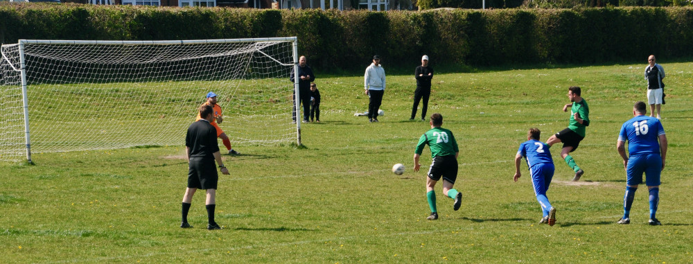 Ben Grogan scoring from the penalty spot in cup finalthe Shotley Rose 