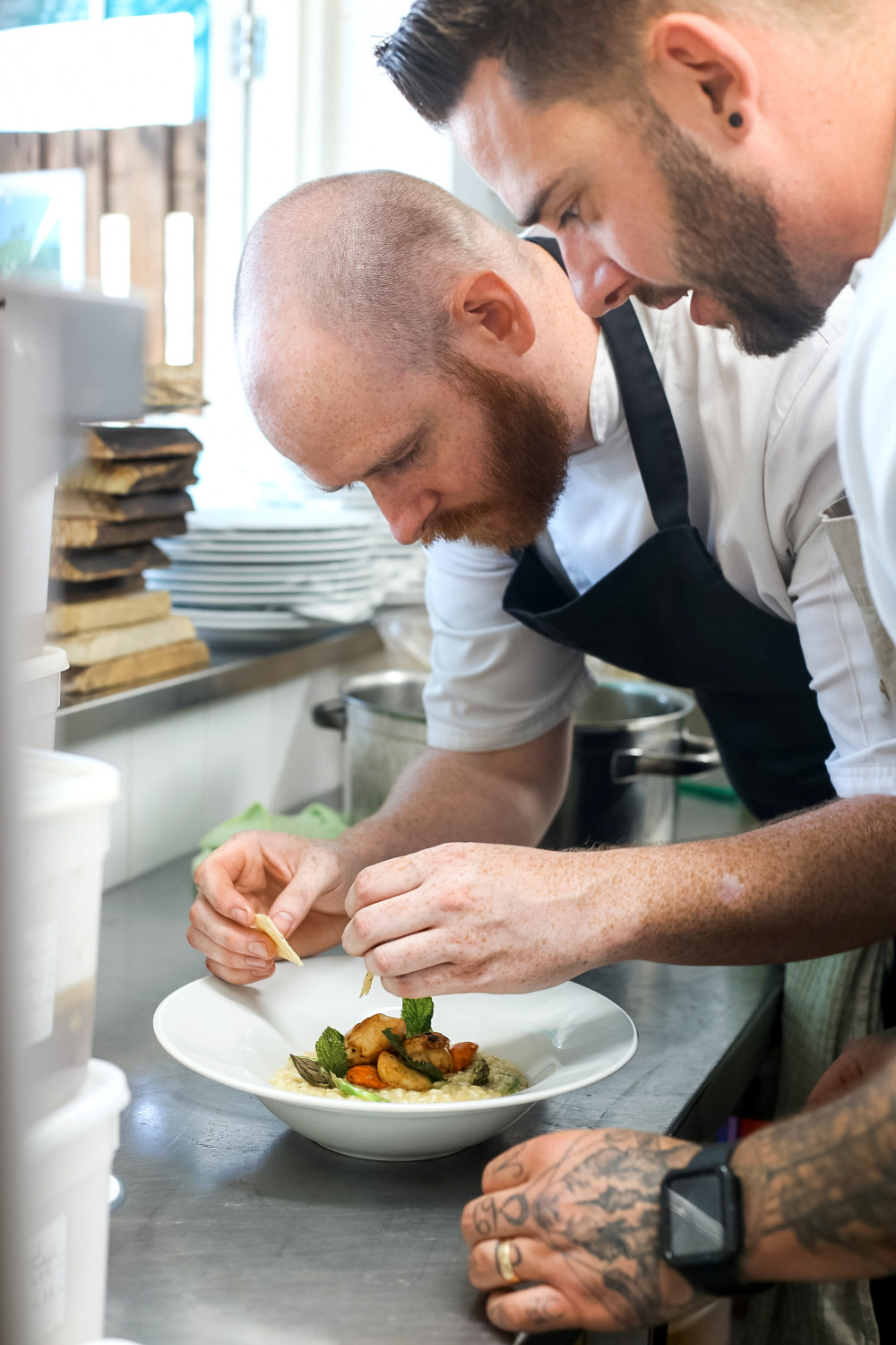 Andy and Lewis creating the risotto and scallop dish