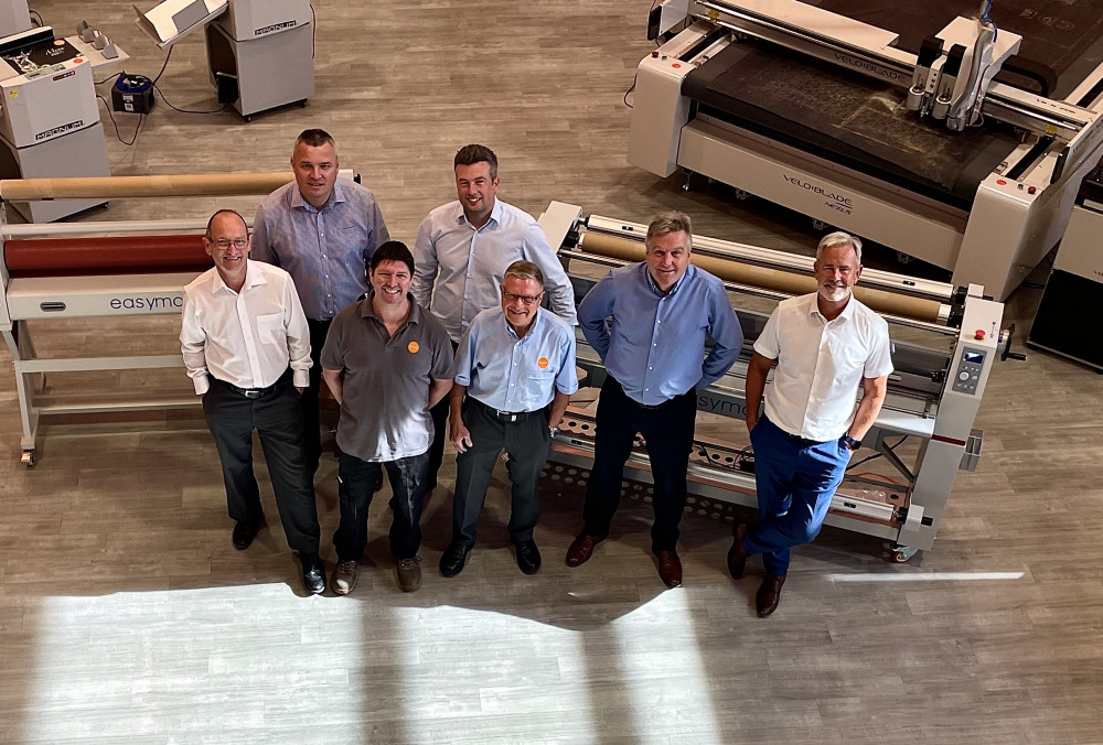 Vivid employees (from L) Martyn Culver, assistant service manager, Richard Marlow, sales director, Andrew Haywood, warehouse manager, Gavin Ward, technical director, Dave Roberts, assistant service manager, Bruce Cozens, export director and Martin Evans, managing director.   