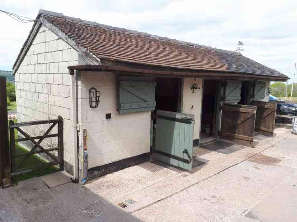 The old stable building is located on Woodhouse Lane