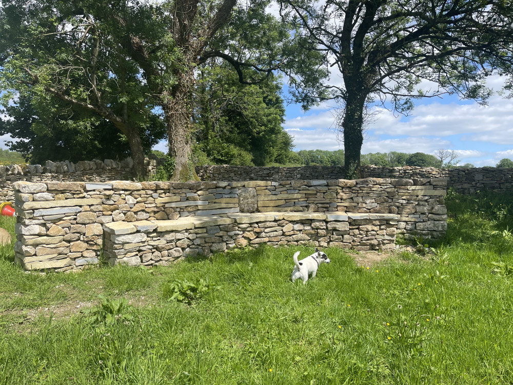 A dry stone bench at Five Trees Bowlish