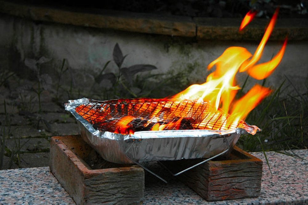 Crewe firefighters put out a fire caused by four unattended disposable barbecues - August 4 (Wikimedia).