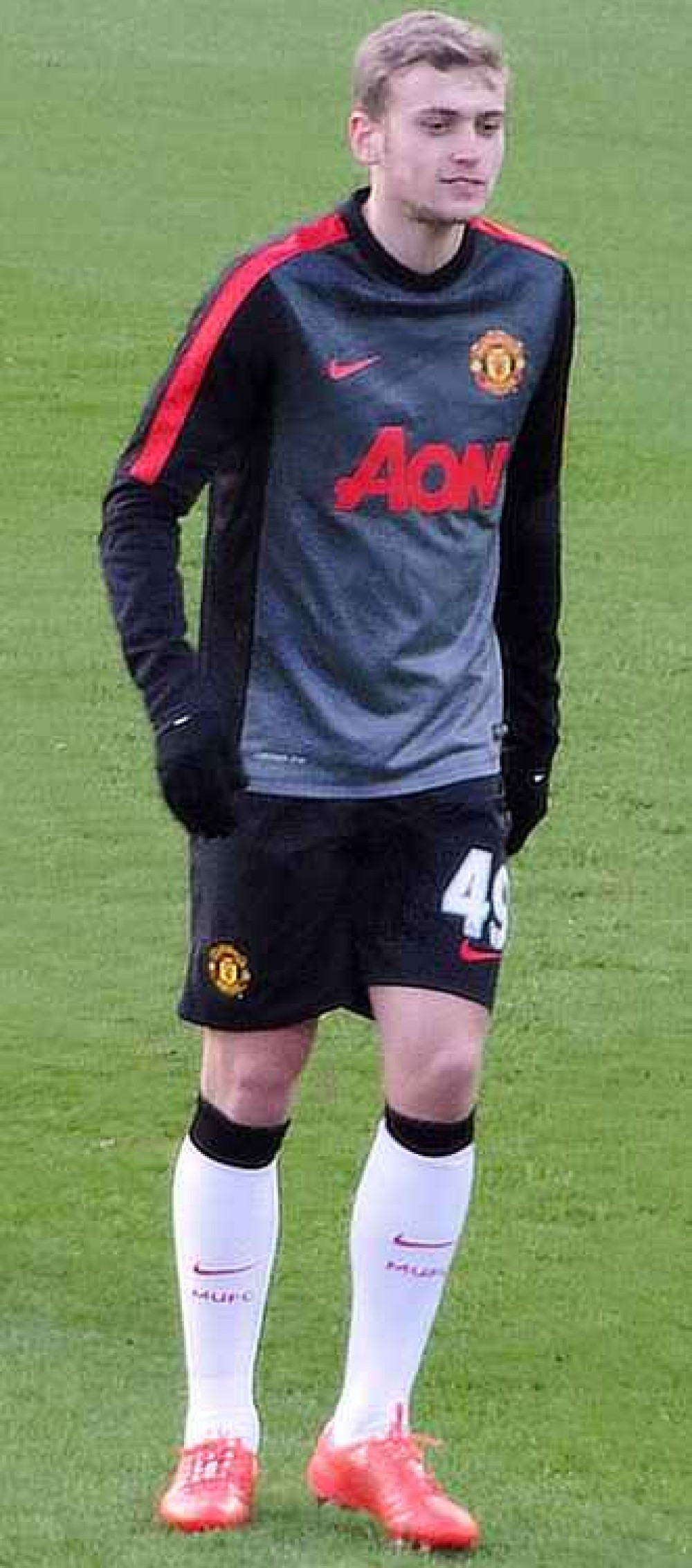 James Wilson warming up for Manchester United in 2015.