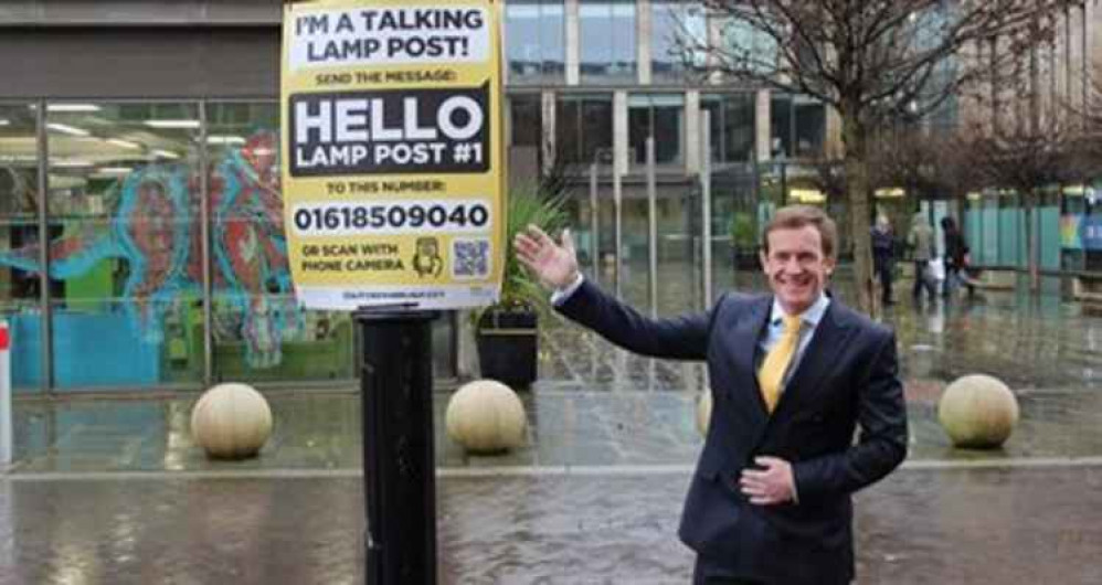 Cllr Alan White by one of the signs Cllr Alan White by one of the signs