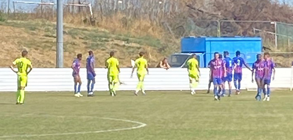 Laste Dombaxe begins the long walk to his dressing room after being sent off.