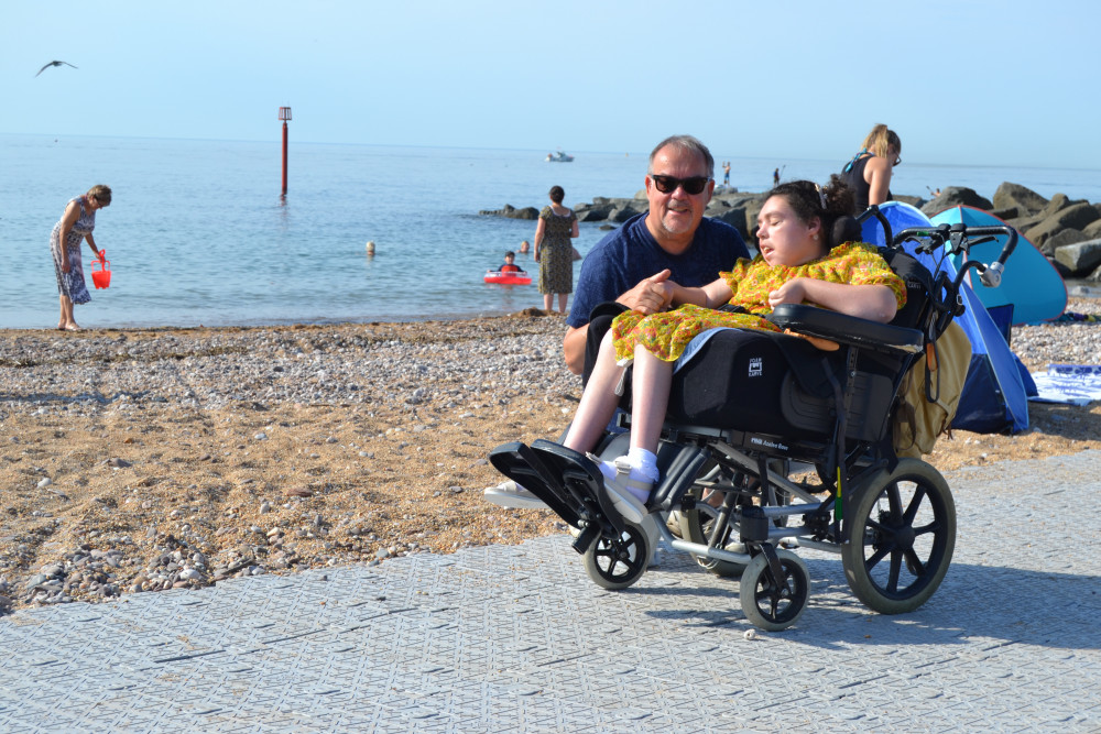 Neil and his daughter Lucy on the beach at West Bay