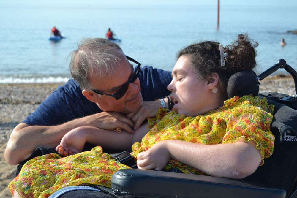 Neil and his daughter Lucy on the beach at West Bay