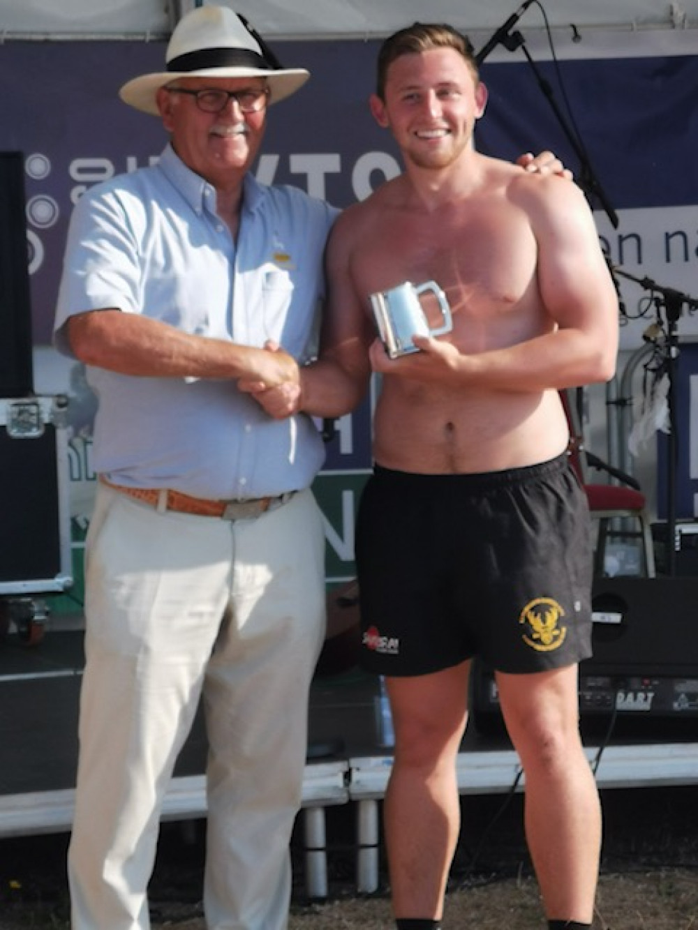 Letchworths Josh Sharp receives the Graham Walker trophy from. CREDIT: Tim Bonnet