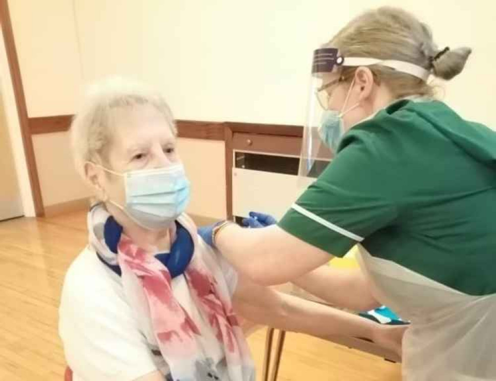 A woman receives the Covid vaccine at Biddulph Town Hall. Image credit: Biddulph Doctors