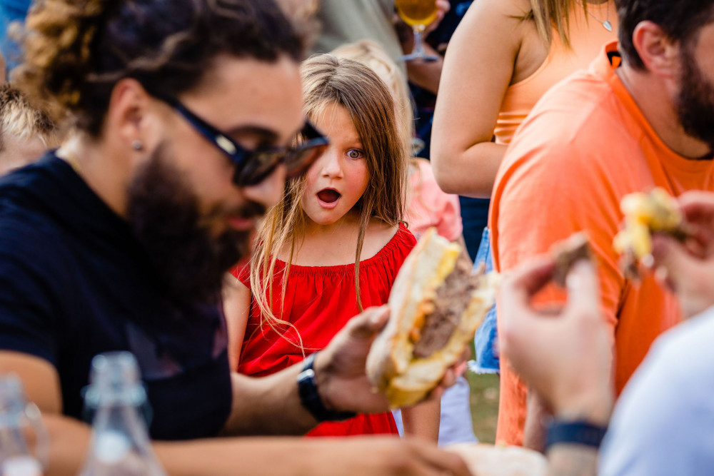 YouTuber downs 4lb burger – with sides – to win county contest. CREDIT: Danny Loo/StrandPR