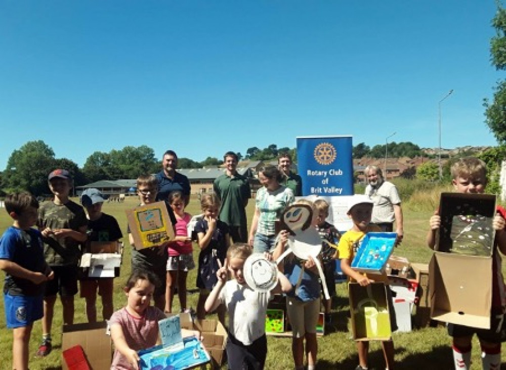 Local artist Jo Burlington is working with children at Bridport Leisure Centre's summer camp to create the mural