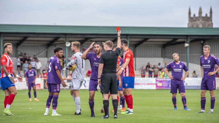 Bromsgrove Sporting 2-1 Hitchin Town. PICTURE: A pivotal moment as Lewis Barker is sent off early on. CREDIT: Peter Else 