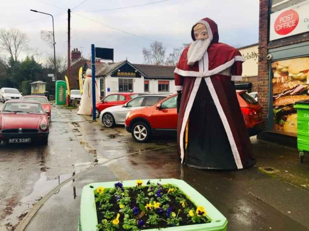 The giant Father Christmas in Helsby today. Photo: Ho Ho Helsby The giant Father Christmas in Helsby today. Photo: Ho Ho Helsby