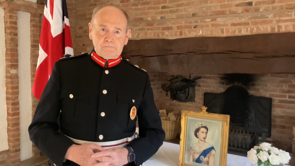 Sir John Peace with a headshot of Queen Elizabeth II. Image: Nottinghamshire County Council. Sir John Peace with a headshot of Queen Elizabeth II. Image: Nottinghamshire County Council.