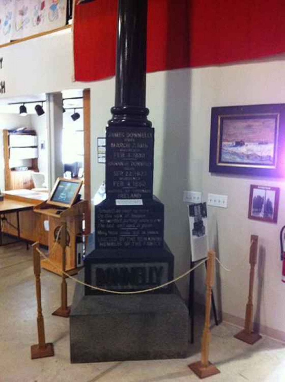 A replica of the original Donnelly tombstone is currently on display in a museum in Lucan Biddulph.