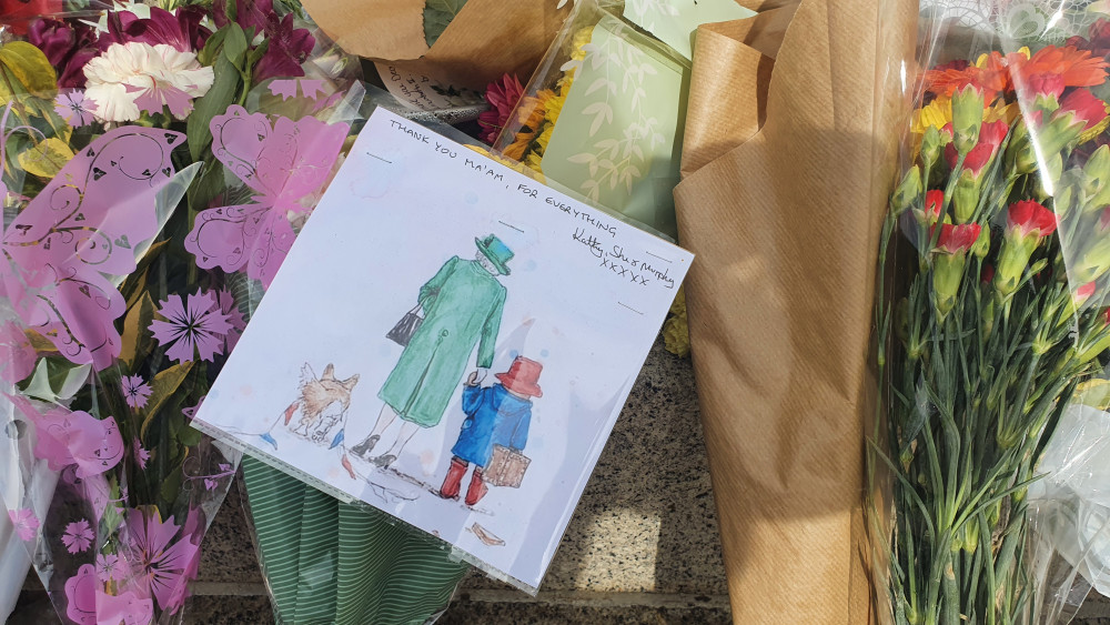 A selection of flowers laid at the War Memorial 