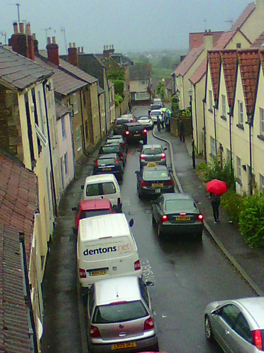 Cars being forced up on the pavement in Castle St,