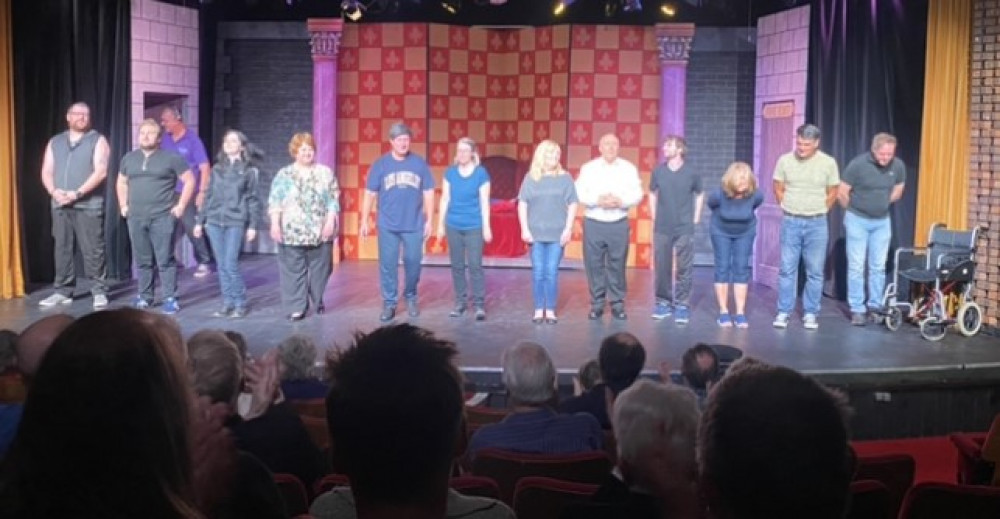 Curtain call for the cast and crew.